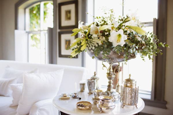 Bouquet and silver on living room table